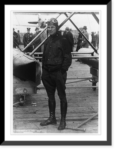 Jimmy Doolittle, full-length portrait, standing, facing left, in flying clothing in front of one of his airplanes Classic, Historic Reproduction