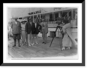 Pres. Harding and four other people being filmed on dock by Mrs. E.B. McLean, Historic Print