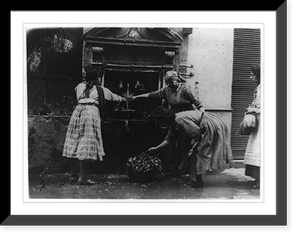 Washing fruits and vegetables at a public spigot. Italian tenements adjacent to St. Peters, Rome, Italy, Historic Reproduction