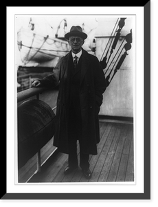 Historic Framed Print, [George Eastman, full-length portrait, facing front, standing on deck of S.S. Aquitania],  17-7/8" x 21-7/8"