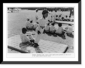 Physical training class. Primary school pupils practice gymnastics on mats as part of their regular physical education course, Vintage Wall Art