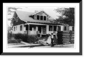 Couple looking at unfinished house, with wall laths out front Classic, Antique Poster
