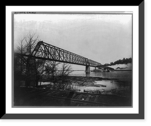 Stern-wheel riverboat passing under Illinois Central Railroad bridge over Ohio River, Cairo, Illinois, with logs lashed together at river's edge Classic, Antique Print