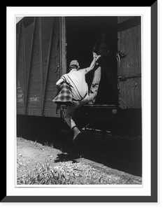 Historic Framed Print, [Man helping another man hop a freight car, Bakersfield, California],  17-7/8" x 21-7/8"