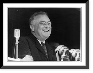 Historic Framed Print, [Franklin Delano Roosevelt, head-and-shoulders portrait, facing right, at microphones, smiling],  17-7/8" x 21-7/8"