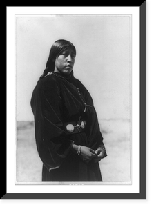 Arapaho maiden, three-quarter-length portrait, standing, facing right, Vintage Poster