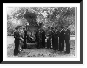 Historic Framed Print, [Group of twelve White House news photographers placing a wreath at monument to Louis J.M. Daguerre, Washington, D.C.],  17-7/8" x 21-7/8"