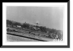 German airplane in flight over open field during World War II Classic, Historic Reproduction
