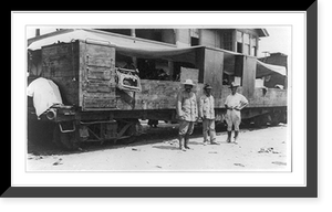 Historic Framed Print, [Three soldiers standing by armored railroad car, of S.P.deM. train, during the Mexican revolution],  17-7/8" x 21-7/8"