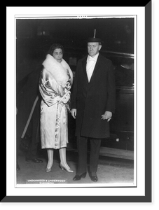 President Coolidge attends opera. President and Mrs. Calvin Coolidge arriving at Poli's theatre in Washington for the opening of the Metropolitan Opera Company's presentation of Norma Heritage Wall