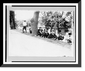 Group of boys with golf clubs. probably caddies. resting on hill Classic, Antique Poster