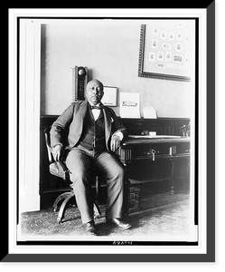 Arthur Simmons, White House staff member, seated in office lobby of the White House, Vintage Print