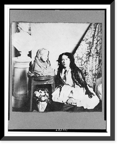 Historic Framed Print, [Vinnie Ream Hoxie, full-length portrait, kneeling by two bust statues, facing slightly left],  17-7/8" x 21-7/8"