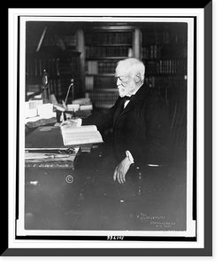 Historic Framed Print, [Andrew Carnegie, three-quarter length portrait, seated at desk, reading, facing left].Marceau, New York.,  17-7/8" x 21-7/8"