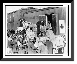 Historic Framed Print, Red Cross distributes a carload of citrus fruit donated for the drought-stricken in Mississippi, by fruit growers around Lake Wales, Florida,  17-7/8" x 21-7/8"