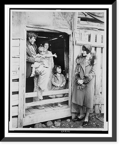 Historic Framed Print, A hearty welcome to the Red Cross lady. A family of share croppers,  and their Arkansas farm home,  17-7/8" x 21-7/8"