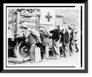 Historic Framed Print, Going to eat hearty this evenin'" grinned these small boys,  as they shouldered Red Cross rations up to Betsy Lane camp,  Floyd County,  in the mountains of Kentucky.,  17-7/8" x 21-7/8"