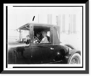 Historic Framed Print, [Man and woman, in automobile, in the Washington, D.C., area],  17-7/8" x 21-7/8"