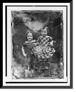 Two unidentified girls, about three and five years of age, the younger child seated in high chair, older one standing beside her on left, both nearly facing front, Antique Print