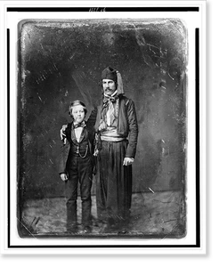 Vintage Portrait - man in Middle Eastern costume with arm around boy