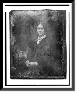 Historic Framed Print, [Unidentified woman, three-quarter length portrait, facing front, seated beside small table with tablecloth],  17-7/8" x 21-7/8"