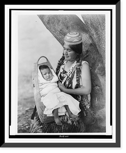 Historic Framed Print, [Hupa mother, three-quarter length portrait, seated, facing left, holding baby],  17-7/8" x 21-7/8"