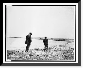 Black & White Photo - Chicago - Two men foraging along shoreline