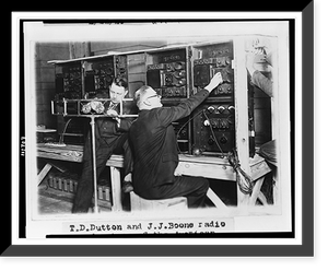 T.D. Dutton and J.J. Boone, radio broadcasters of the American Telephone and Telegraph Co., testing the installation for broadcasting the inaugural ceremonies, Historic Reproduction