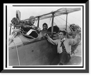 Houdini on wing of airplane in scenes from The grim game"", Historic Reproduction