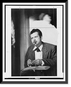 Orson Welles with script in lap, cigar in mouth watching rehearsal of his Around the World"", Vintage Wall Art