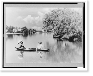 Vintage Landscape - Denver - Couples canoeing on lake in City Park