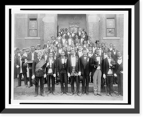 African American men posed at entrance to building, some with derbys and top hats, and banner labeled Waiters Union" in Georgia", Historic Reproduction