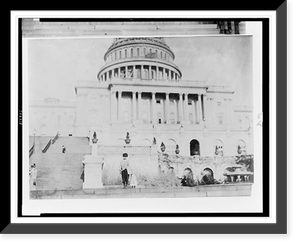 Historic Framed Print, Dan Mercurio, 9 yrs. old newsie, a chronic truant, selling on Capitol grounds, said he made 8 cents to-day. Lives 150 Schottes Alley. Began at 7 yrs. Location: [Washington (D.C.), District of Columbia],  17-7/8" x 21-7/8"