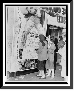 Teenage girls add to grafitti on bottom of Elvis movie poster.World Telegram & Sun photo by Phil Stanziola, Vintage Poster