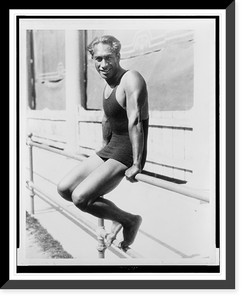 Historic Framed Print, [Olympic swimmer Duke Kahanamoku sits on railing],  17-7/8" x 21-7/8"