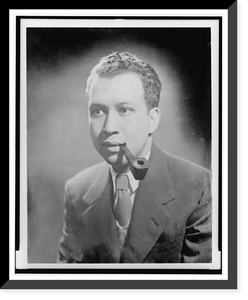 Historic Framed Print, [Frank Yerby, half-length portrait, facing left, smoking pipe],  17-7/8" x 21-7/8"