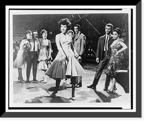 Rita Moreno singing America" with other members of the "Sharks" on movie set for the musical "West Side Story"", Vintage Print