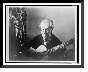Andr&eacute;s Segovia, half-length portrait, seated, facing slightly left, playing guitar, Historic Reproduction