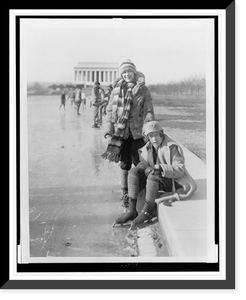 Abbey Jackson, seated, and Celene DuPuy ice skating on reflecting pool, with Lincoln Memorial in background, Antique Poster