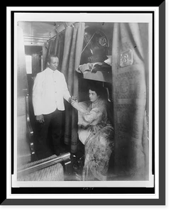 Historic Railroad - Railroads & Depots - Porter handing young woman