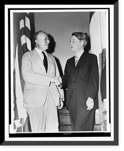 Dr. Alvin Johnson, left in three-quarter length portrait, shaking hands with Jacques Maritain, Antique Poster