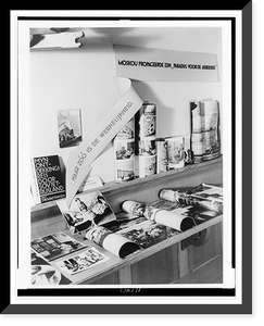 Exhibit of chiefly anti-communist and anti-Jewish propaganda, with book, photographs, and posters on shelves, The Hague, Netherlands Classic, Historic Print