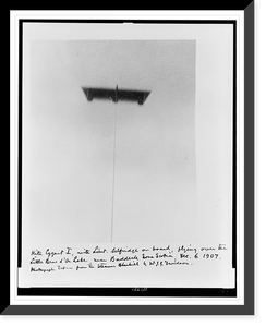 Kite Cygnet I, with Lieut. Selfridge on board, flying over the Little Bras d'Or Lake, near Baddeck, Nova Scotia, December 6, 1907, Antique Poster