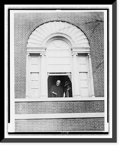 Ex-President Wilson and Mrs. Wilson at the window of their home, from where Mr. Wilson saluted the Delegation of the United Daughters of the Confederacy, Historic Reproduction