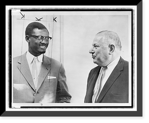 Patrice Lumumba (left) confers with Andrew Cordier at the United Nations, Vintage Poster