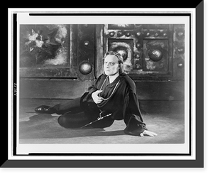 Act I, Scene 2 of Hamlet, showing Hamlet reclining on leg and left hand, Mayakovsky Theater, Moscow, Russia, Vintage Poster