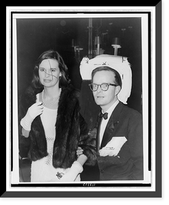 Historic Framed Print, [Truman Capote, half-length portrait, facing left, escorting Gloria Vanderbilt],  17-7/8" x 21-7/8"