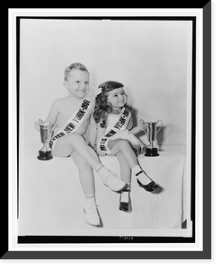 Historic Framed Print, [Kenneth Ray Pierce (Master New York, 1951) and Patricia Ann Pati (Miss New York, 1951), winners of the Prize Baby Pageant sponsored by the Loyal Order of the Moose, posed, seated, holding trophies],  17-7/8" x 21-7/8"