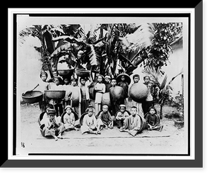 Historic Framed Print, [Group of children, with baskets, posed under palm tree, Saigon, South Vietnam],  17-7/8" x 21-7/8"