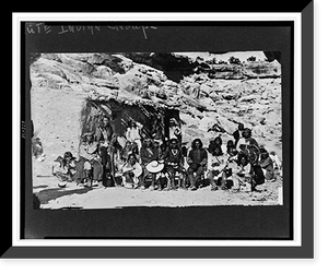 Historic Framed Print, [Paiute Indian group posed in front of adobe house],  17-7/8" x 21-7/8"